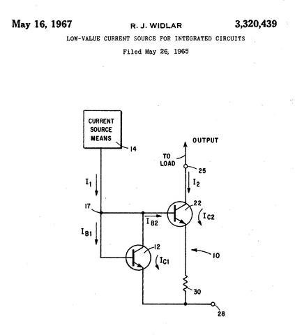R.J.Widlar, judging by the LM10 circuit design at which he's looking.